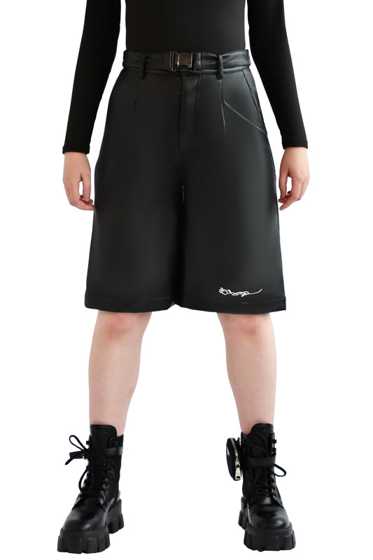 Black faux leather wide leg shorts with buckled belt strap