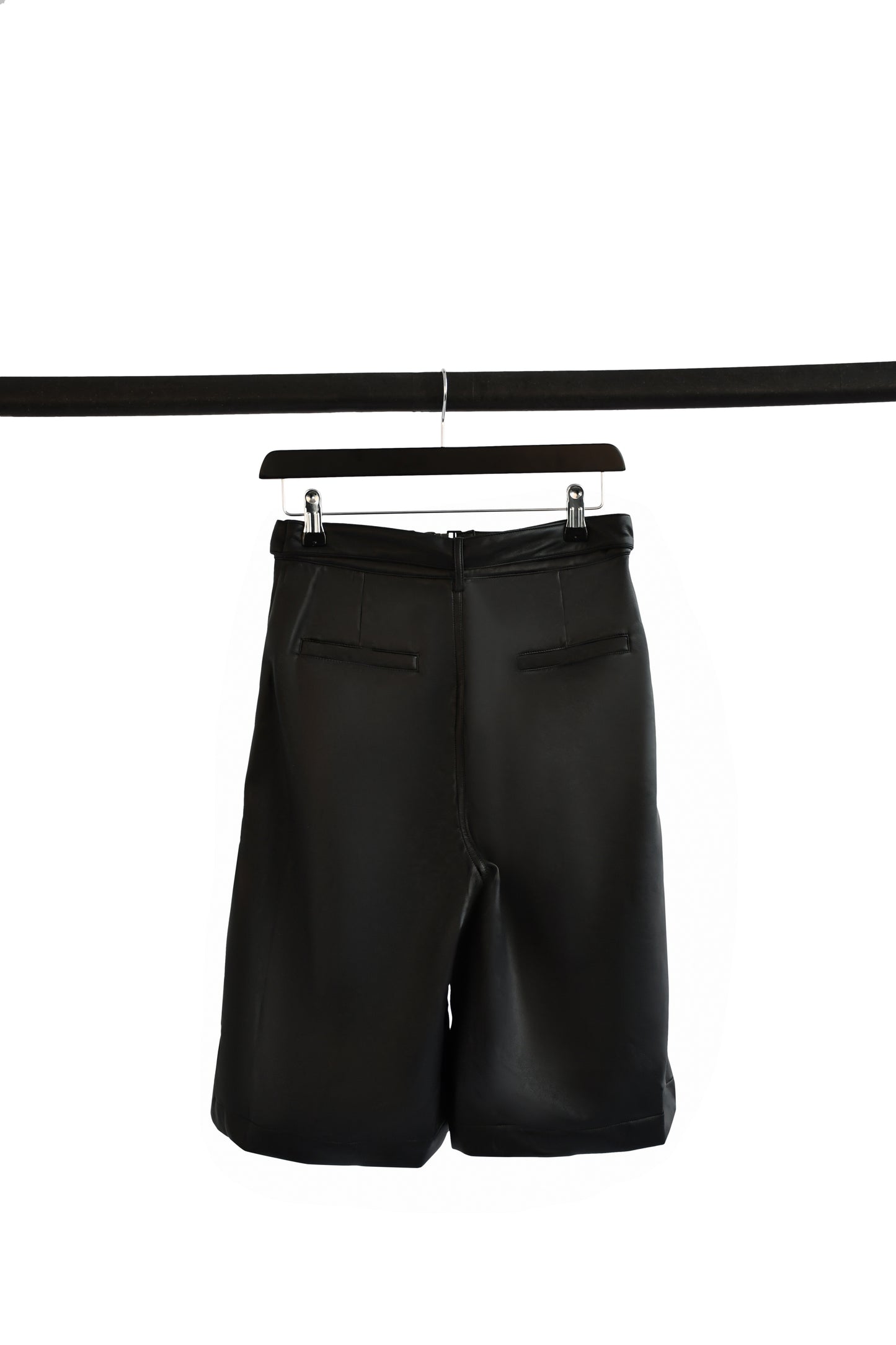 Black faux leather wide leg shorts with buckled belt strap